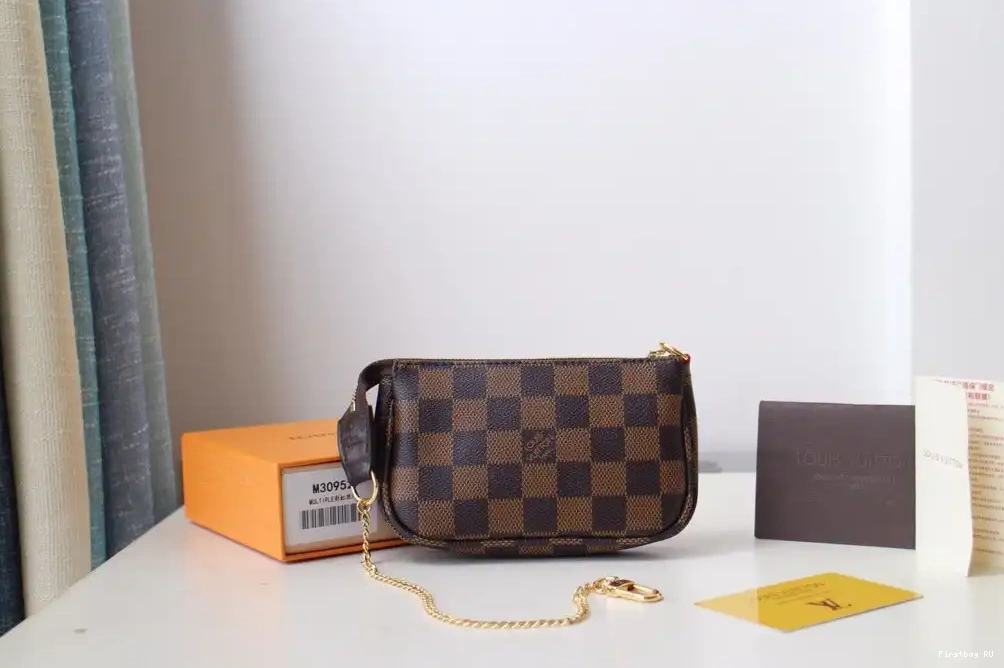 VUITTON LOUIS POCHETTE MINI ACCESSOIRES 0625